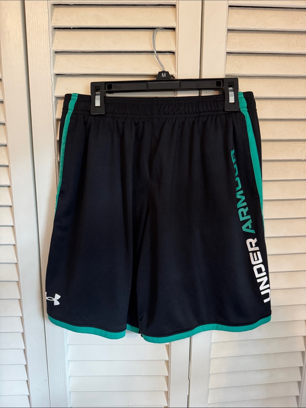 Under Armour BOYS YOUTH LARGE Black Athletic Shorts with Teal Trim and Logo